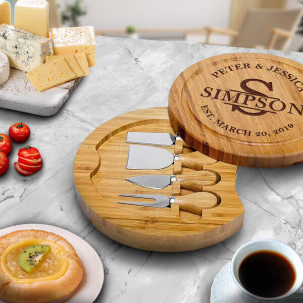 https://www.asperadesign.store/wp-content/uploads/2021/11/2.-Creative-Kitchen-Decor-Ideas-Large-Round-Cutting-Board-Marble-and-Wood-Cheese-Board-Ninja-Knife-Set-and-Dessert-Charcuterie-Board-Aspera-Design-600x600.jpg