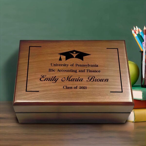 A beautifully engraved wooden box for a Masters Degree graduation.