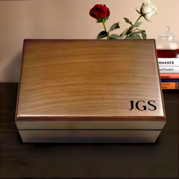 Handcrafted wood box with custom engraving, perfect for storing keepsakes or jewelry.